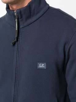C.P. Company pull zippé à col montant